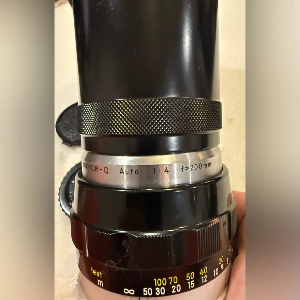 Nikon Nikkor-Q Auto 1:4 f=200mm. Japan vintage includes vintage leather case.